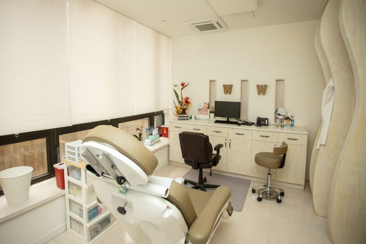 Dermatology exam room with treatment chair at a DR WW office