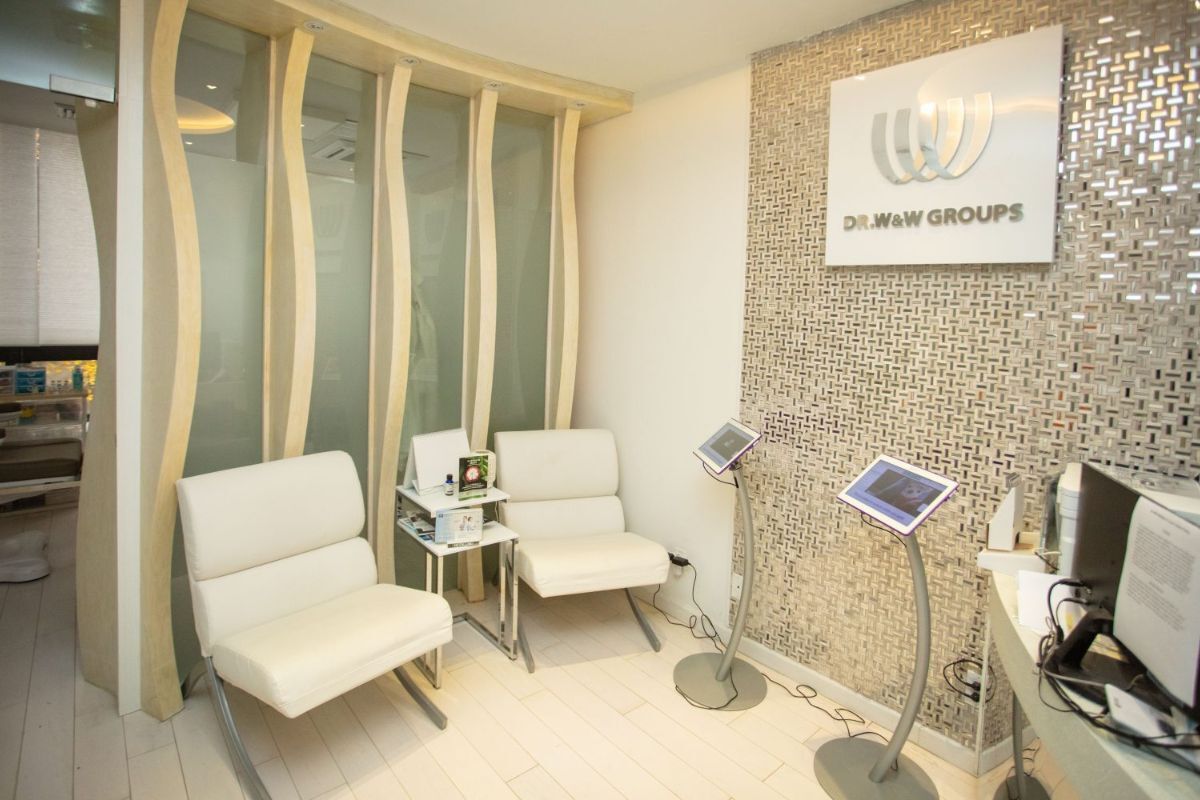 Waiting area with Dr. W&W Groups signage at a DR WW Dermatology office