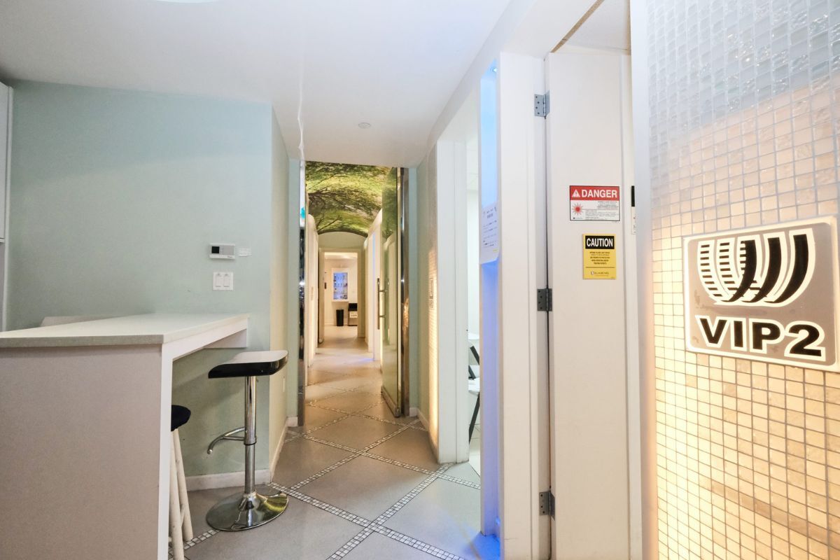 Hallway to a private treatment suite at a DR WW Dermatology office